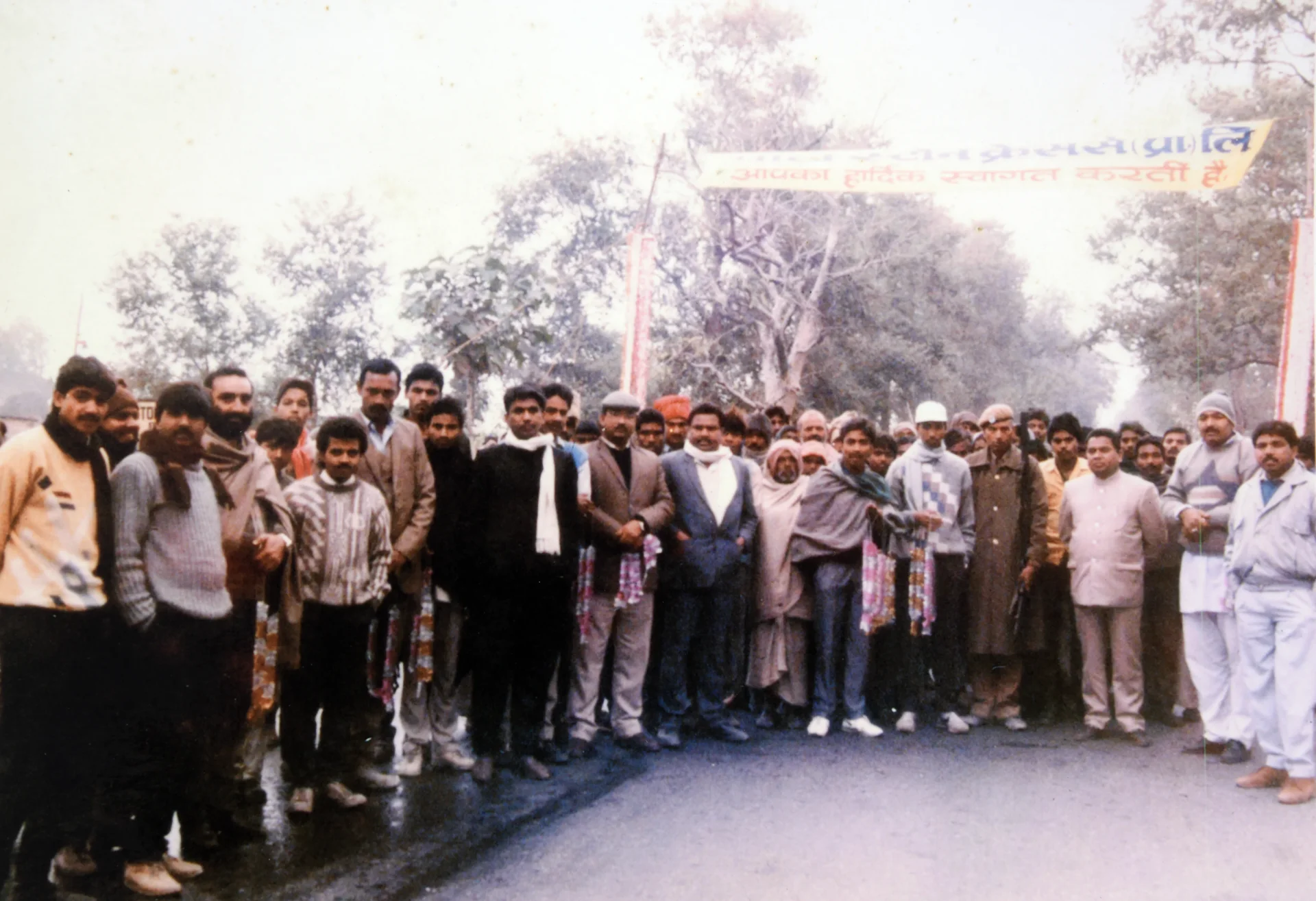 An archival photograph of a group gathering outdoors